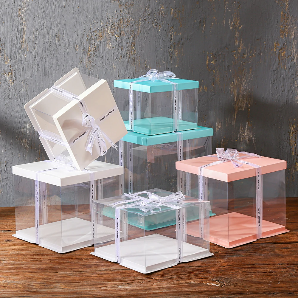 Clear cake boxes with transparent sides in multiple sizes and lid colors for tall and layered cakes