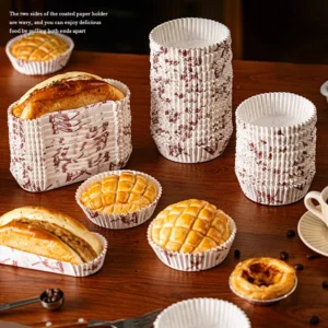Oven-safe paper baking molds in round and rectangular shapes for bread and cakes